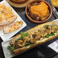 Patatas y bocadillo de heura at La Cerveseria Clandestina in Barcelona