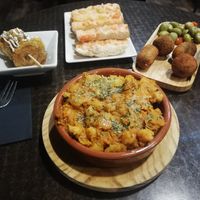 Croquettes, tostodos, squash & chickpea dish at La Cerveseria Clandestina in Barcelona