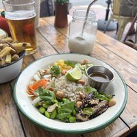 Vegan Asia Rice Bowl and vegan Cocktail (coconut waterfall)  at Project Social in Ibiza