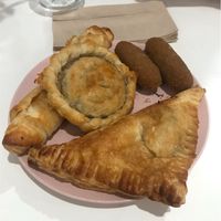 Cheese roll-up, guava and cheese pastelito, “meat” pastelito, and jackfruit croquetas at Ali's Sweet Treats in Miami