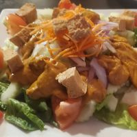 Cucumber Salad with Peanut Sauce & fried tofu. So good!! at Five Star Thai Cuisine in Crown Point