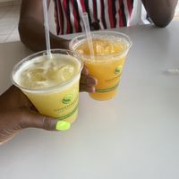 Pineapple ginger juice (yellow) & passion fruit juice (orange) both were delicious! They have chunks of pulp which make it taste even more refreshing and tasty!  at Bori Vegan in Guaynabo