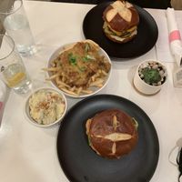 Smokey bbq burger, Thia chkn sandwich, potato salad and chili cheese fries.  at P.S. Kitchen in New York City
