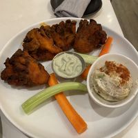 Buffalo wings (deep fried in batter)    at P.S. Kitchen in New York City