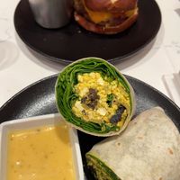 Breakfast burrito, burger, truffle fries  at P.S. Kitchen in New York City