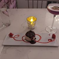 Absolutely delicious cheesecake and scrumptious lavender Cocktail! 🍸 at P.S. Kitchen in New York City