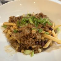 Chili cheese fries are a mustt  at P.S. Kitchen in New York City