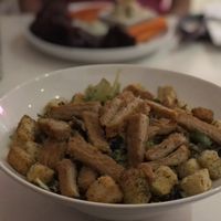 Caesar salad with crispy “chicken"  at P.S. Kitchen in New York City