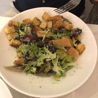 caesar salad with crispy chicken at P.S. Kitchen in New York City