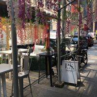 restaurant entrance and outdoor seating at P.S. Kitchen in New York City