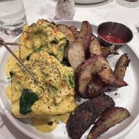 Eggs Florentine with potatoes  at P.S. Kitchen in New York City