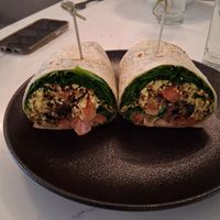 Organic Tofu Scramble, Spinach, Smokey Mushrooms, Tomato, and Chipotle Mayo wrapped in a Flour Tortilla. at P.S. Kitchen in New York City