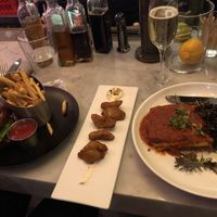 PS Burger, crispy artichoke and lasagne at P.S. Kitchen in New York City