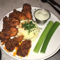 Vegan buffalo cauliflower wings and potato salad!! at P.S. Kitchen in New York City