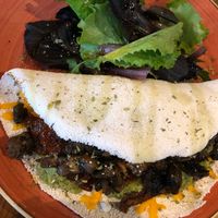 Gluten free began pancake with avocado, mushrooms, sundries tomatoes and vegan cheese at Zenith in Porto