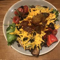 Vegan toast with avocado, vegan cheese, mushrooms, tomato, strawberries and relish  at Zenith in Porto