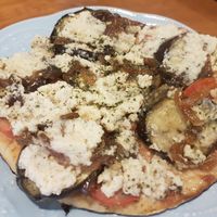 Eggplant pizza with vegan cheese at Twins Cafe GF in Lima