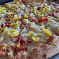 Built a pizza with vegan cheese. This is a large. at Backwoods Brewing Company in Carson