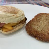 Breakfast sandwich & hashbrown  at Plant Power Fast Food - Encinitas in Encinitas
