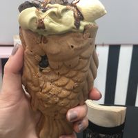 taiyaki style cone with vegan choc and matcha ice cream, choc toppings and vegan marshmallows  at Malvy's Shakes in Madrid