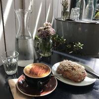 Cappuccino And almond pan au chocolate  at Gathered Kitchen in Glebe
