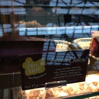 Cake display. Use google translate or ask server to translate. at Love It Raw in Bucharest