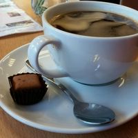 Coffee cane with a vegan choc on the side! at Mocha in Richmond