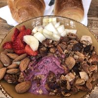 Açai bowl and vegan croissant  at Shake Cafe - Del Corso in Florence