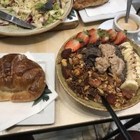 vegan chocolate smoothie bowl with toppings& vegan croissant with jam at Shake Cafe - Del Corso in Florence