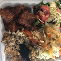 Orange and curry chicken and rice.  at I Juice & Smoothies in Decatur