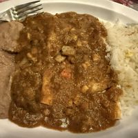 Cold beans, unflavored rice. The nopales enchiladas were ok.   at Kahlo's Restaurant  in Denver