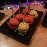 Vegan burgers with beans and caramelized onions with red bell peppers and tomato bread. at Fusiona Gastrobar in Merida