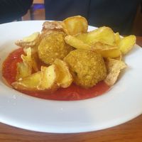 Rice balls with tomato sauce at Garraxi Restaurante Vegetariano in San Sebastian