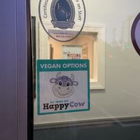 Nice to see Happy Cow on the door!  at Mandy's Pizza in Pittsburgh