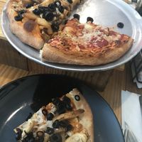 Chicken parm pizza and buffalo chicken pizza with added black olives  at Mandy's Pizza in Pittsburgh