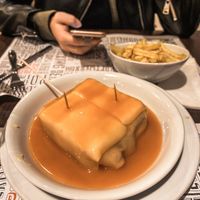Vegan Francesinha with vegan cheese and Fries, round about 11€ - picture from january 2020 at Lado B Cafe in Porto
