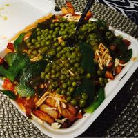 La veganomane with extra peas and green peppers. at La Banquise in Montreal