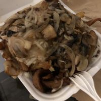 Vegan poutine with mushrooms and onions at La Banquise in Montreal