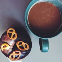 donut and coffee at Blue Vegan Pig Shop in Prague