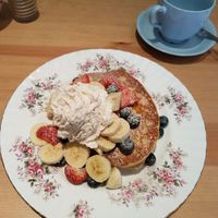vegan pancakes with fruit and cream at The Orchard Cafe in Worthing