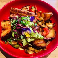 Beautiful orchard potatoes with vegan sausages and avocado  at The Orchard Cafe in Worthing