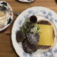 Pancakes with vegan cheese & Seitan, plus a side of Victoria sponge 🙏🏻 at The Orchard Cafe in Worthing