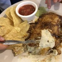 Enchilada before my kid scraped the mole of to the side  at Mexicali in Makati