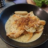 Dumplings with potato "cheese", "bacon", carrot at Elephant in the Room in Thessaloniki