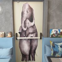 The most beautiful Fire Exit Door mural ever! 💚 at Elephant in the Room in Thessaloniki