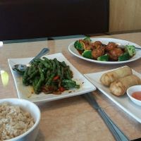 spring rolls, string bean appetizer, orange peel veg meat, and a special noodle soup made with ginger and tomato. at Ma Ma Wok in Charlotte
