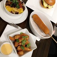 Burger, Mac'n cheeze, corn dog and coconut skrimp 
(2018) at güd eats in Saskatoon