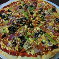 Vegan Kombination pizza (dayia cheese, mushrooms, bell pepper, vegan salami, vegan bacon) at Razzos Pizza And Salads in Hayward