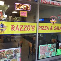 Storefront entrance at Razzos Pizza And Salads in Hayward