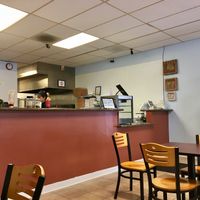 Seating available for small groups at Razzos Pizza And Salads in Hayward